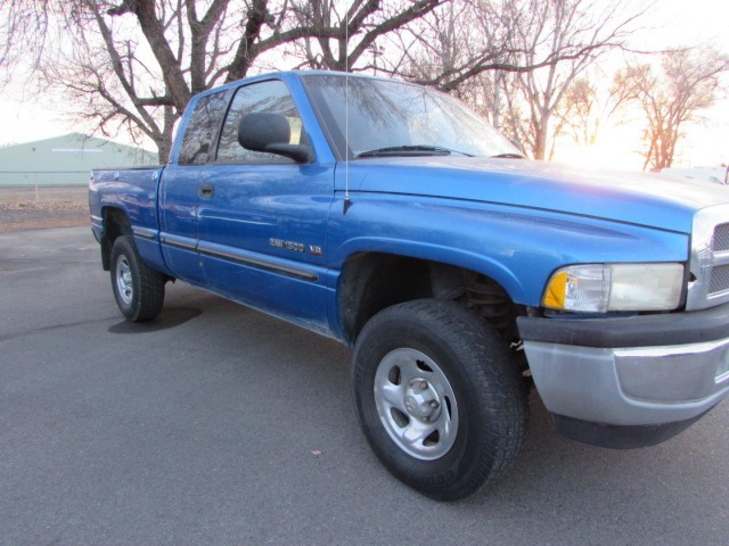 1999 Blue /Gray Dodge Ram 1500 SLT (3B7HF13Y9XG) with an 5.2 V8 Engine engine, 5 speed manual transmission, located at 4562 State Avenue, Billings, MT, 59101, (406) 896-9833, 45.769516, -108.526772 - Photo#4